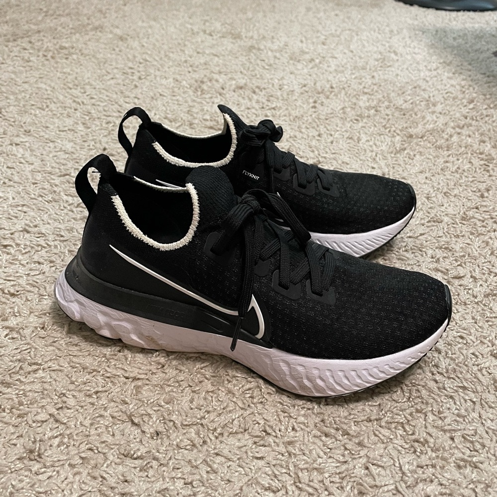 Black Nike running shoe